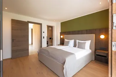 Ein Bett oder Betten in einem Zimmer der Unterkunft Fankhauser Apartments
