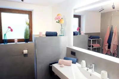 Ein Badezimmer in der Unterkunft HauserA Appartement