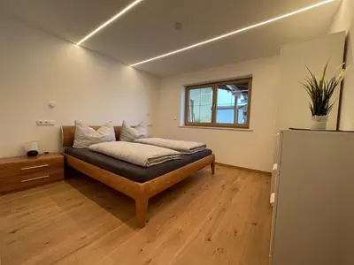 Ein Bett oder Betten in einem Zimmer der Unterkunft Tiroler Hoamatgfühl