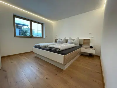Ein Bett oder Betten in einem Zimmer der Unterkunft Tiroler Hoamatgfühl