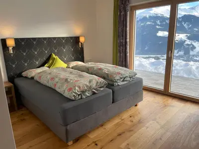 Ein Bett oder Betten in einem Zimmer der Unterkunft Ferienwohnung Traumblick -Familie Seber