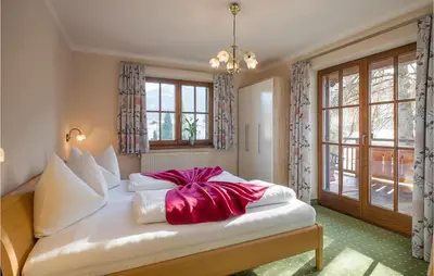 Ein Bett oder Betten in einem Zimmer der Unterkunft Traditionelles Ferienh Soell