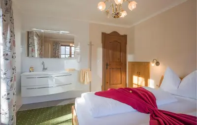 Ein Bett oder Betten in einem Zimmer der Unterkunft Traditionelles Ferienh Soell