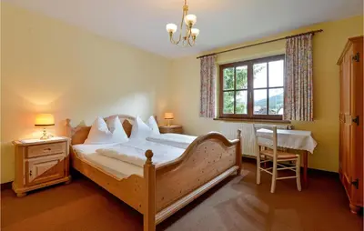 Ein Bett oder Betten in einem Zimmer der Unterkunft Traditionelles Ferienh Soell