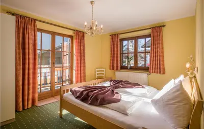 Ein Bett oder Betten in einem Zimmer der Unterkunft Traditionelles Ferienh Soell