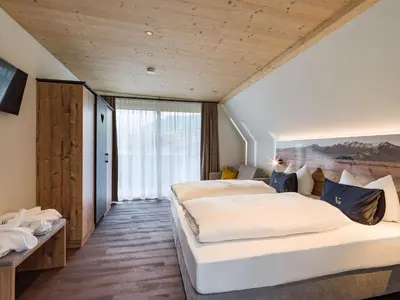 Ein Bett oder Betten in einem Zimmer der Unterkunft Villa Himmlgassl Private Spa