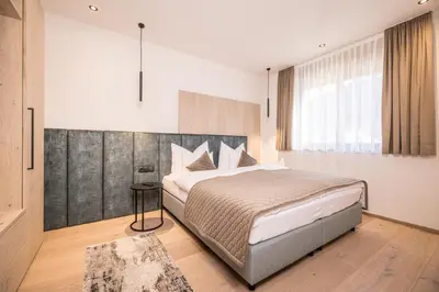 Ein Bett oder Betten in einem Zimmer der Unterkunft Die Zillertalerin