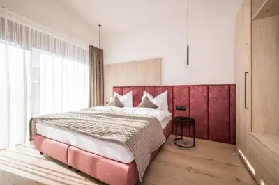 Ein Bett oder Betten in einem Zimmer der Unterkunft Die Zillertalerin