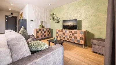 Ein Sitzbereich in der Unterkunft GreenView Apartment