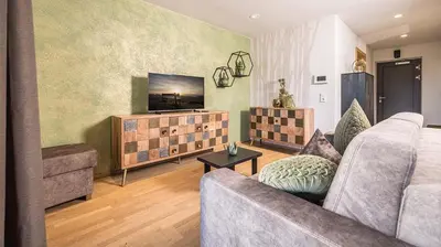 Ein Sitzbereich in der Unterkunft GreenView Apartment