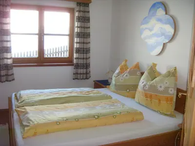 Ein Bett oder Betten in einem Zimmer der Unterkunft Ferienwohnung Obernauer