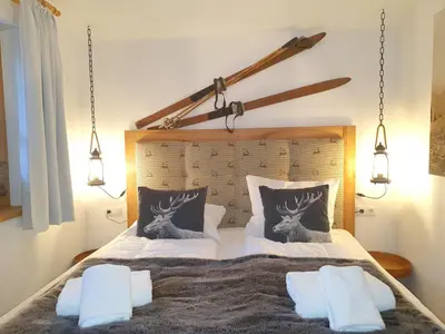 Ein Bett oder Betten in einem Zimmer der Unterkunft Alpen Chalets Zell am See