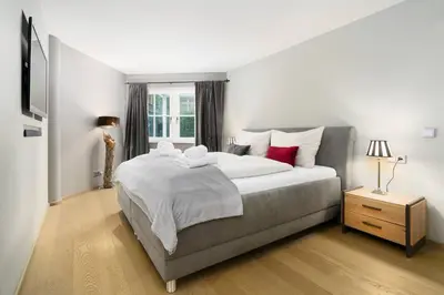 Ein Bett oder Betten in einem Zimmer der Unterkunft Kitz-Heart Apartments by Alpine Host Helpers