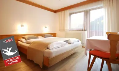 Ein Bett oder Betten in einem Zimmer der Unterkunft Appartement Daniel - inkl JOKER CARD