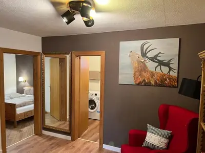 Ein Bett oder Betten in einem Zimmer der Unterkunft Ferienwohnung Steinbock Terrasse, Gartensauna, Garten, Grillplatz