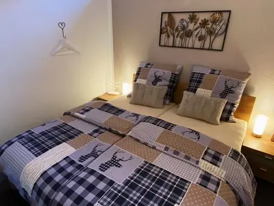 Ein Bett oder Betten in einem Zimmer der Unterkunft Gebirgszauber