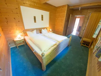 Ein Bett oder Betten in einem Zimmer der Unterkunft Appartementhaus Wildbachhof