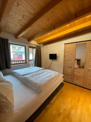 Ein Bett oder Betten in einem Zimmer der Unterkunft Apartment Bergzauber