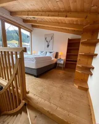 Ein Bett oder Betten in einem Zimmer der Unterkunft Apartment Bergzauber