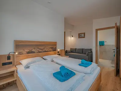 Ein Bett oder Betten in einem Zimmer der Unterkunft Penthouse Brixental with swimming pond