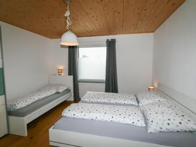 Ein Bett oder Betten in einem Zimmer der Unterkunft Apartment Lisa by Interhome