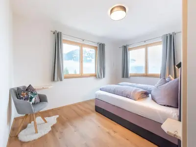 Ein Bett oder Betten in einem Zimmer der Unterkunft Haus Heimat - Alpenrose