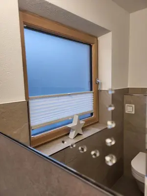 Ein Badezimmer in der Unterkunft Apartment bei Anna
