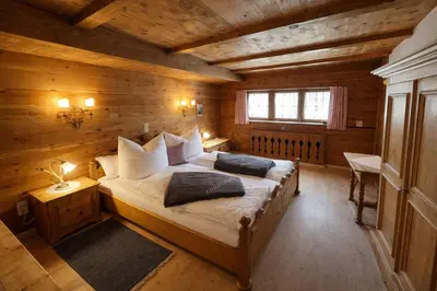 Ein Bett oder Betten in einem Zimmer der Unterkunft NINA's Chalet - by AlpenLuxus Collection