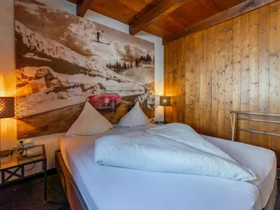 Ein Bett oder Betten in einem Zimmer der Unterkunft Chalet H Königsleiten
