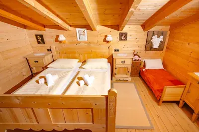 Ein Bett oder Betten in einem Zimmer der Unterkunft Magdalena Hütte