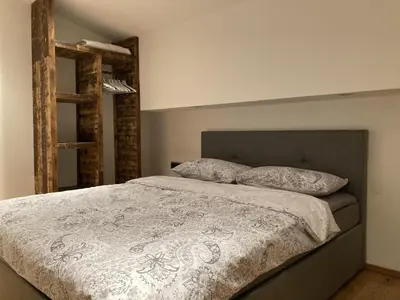 Ein Bett oder Betten in einem Zimmer der Unterkunft Ferienwohnung Bergtraum
