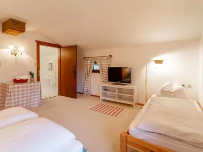 Ein Bett oder Betten in einem Zimmer der Unterkunft Flavon