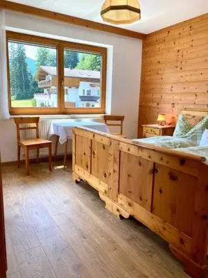 Ein Bett oder Betten in einem Zimmer der Unterkunft Ferienwohnung Birkenheim
