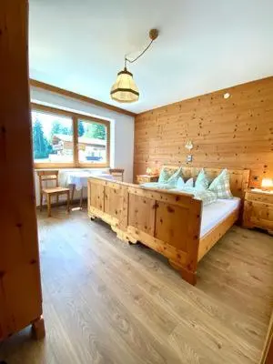 Ein Bett oder Betten in einem Zimmer der Unterkunft Ferienwohnung Birkenheim