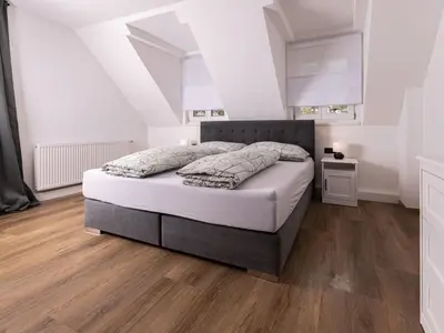 Ein Bett oder Betten in einem Zimmer der Unterkunft Apartment Katharina by Interhome