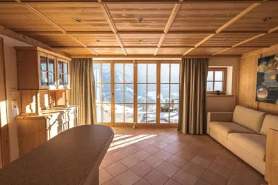 Ein Sitzbereich in der Unterkunft Chalet Obenland Kitzbüheler Alpen Suite