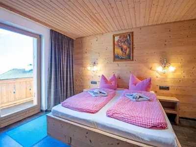 Ein Bett oder Betten in einem Zimmer der Unterkunft Chalet in Fügen near Spieljoch Ski Lift