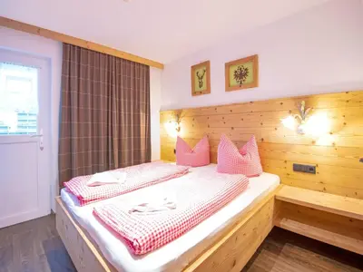 Ein Bett oder Betten in einem Zimmer der Unterkunft Chalet in Fügen near Spieljoch Ski Lift
