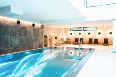 Der Swimmingpool an oder in der Nähe von HENRI Hotel Kitzbühel