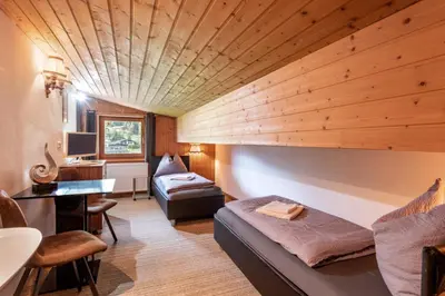 Ein Bett oder Betten in einem Zimmer der Unterkunft Pension Berta